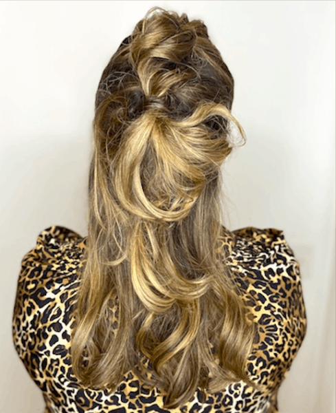 Back of Sami Cone's Hair whimsical partial updo by Stan Newton at Jon Alan Salon Capital View