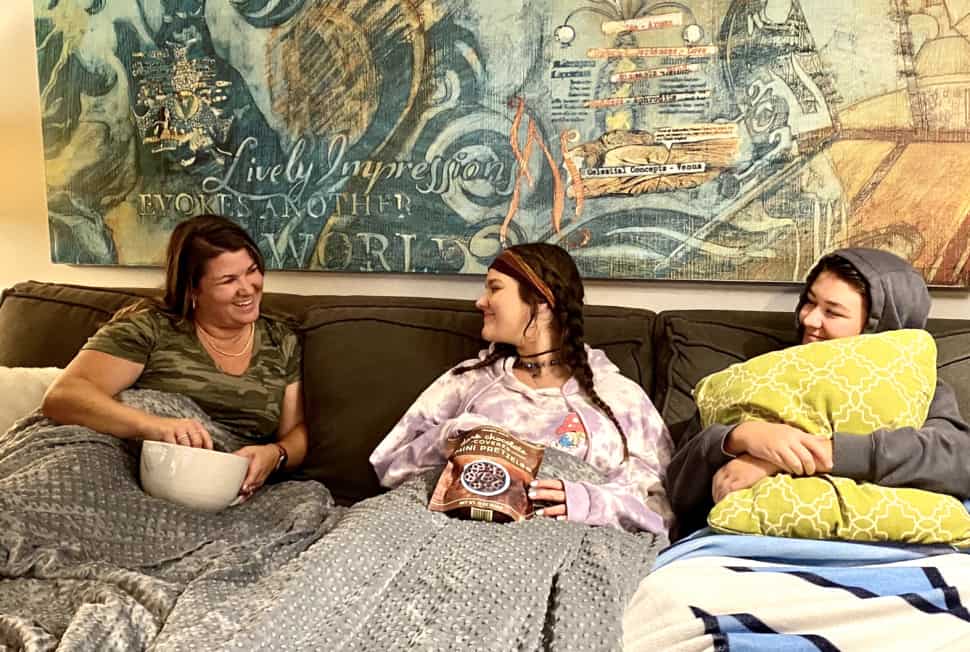 Sami with kids family TV night watching Young Sheldon